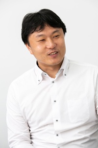 森永乳業株式会社<br>経営戦略本部<br>IT 改革推進部<br>アシスタントマネージャー<br>石井 俊光氏