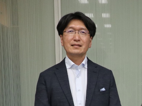 フジテックのCIO（最高情報責任者）である友岡賢二常務執行役員情報システム部長